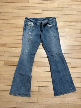 Woman’s American Eagle Distressed Bootcut Jeans